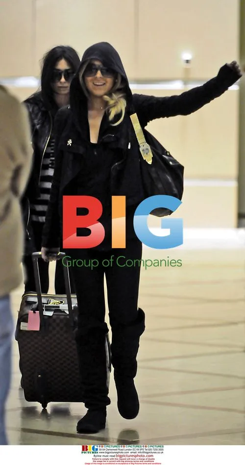 Lindsay Lohan Arrives in LA from Capri