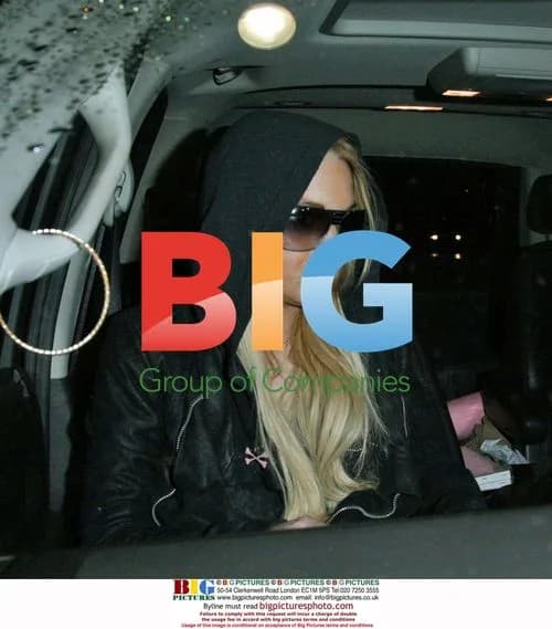 Lindsay Lohan Arrives at LAX