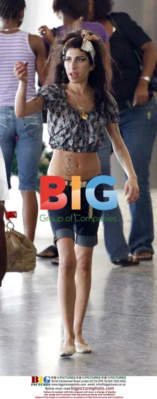 Singer Amy Winehouse Departs Caribbean Airport