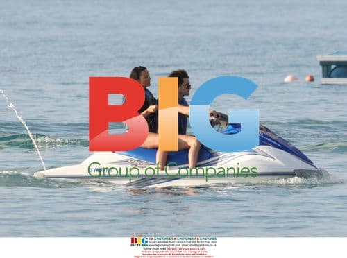 Martine McCutcheon Shows Off Curves on Jet Ski