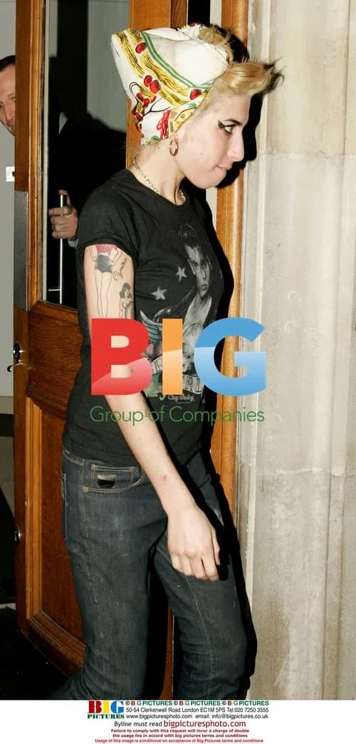 Amy Winehouse Steps Out with Dad in London