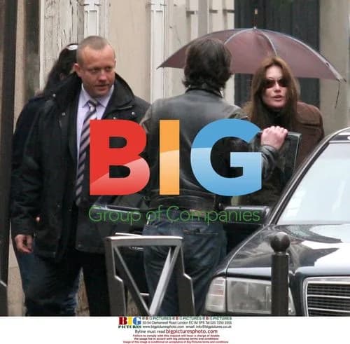 Carla Bruni picks up son from school