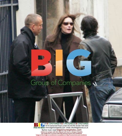 Carla Bruni picks up son from school