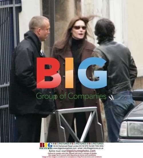 Carla Bruni picks up son from school