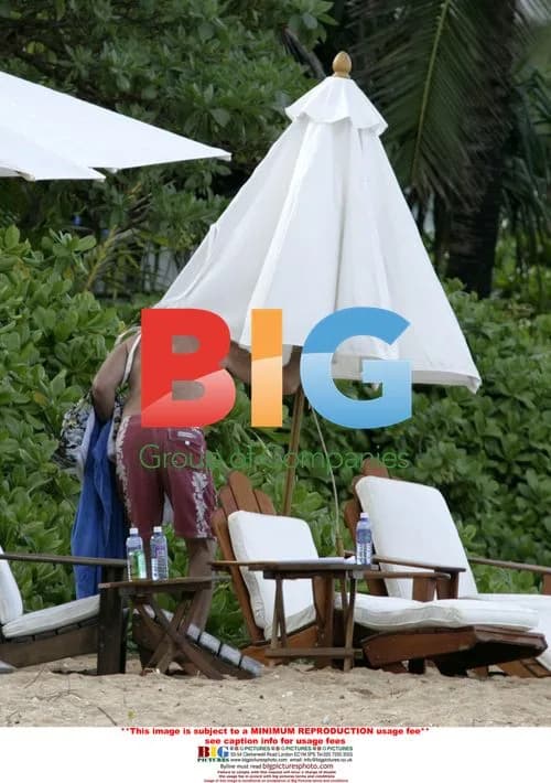 Pierce Brosnan and Keely Shaye Smith relax on Hawaiian beach