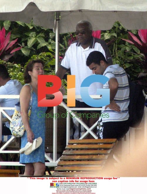 Sir Trevor McDonald on holiday with ex-wife and son