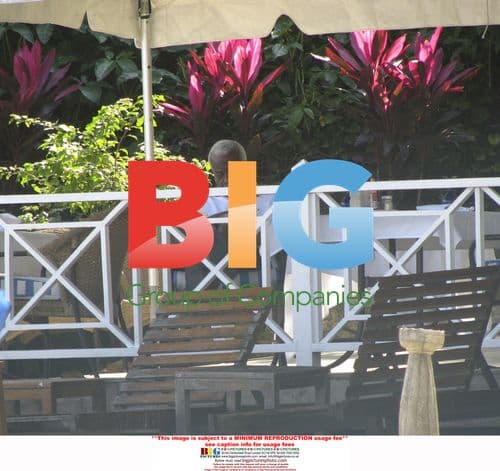 Sir Trevor McDonald on beach vacation