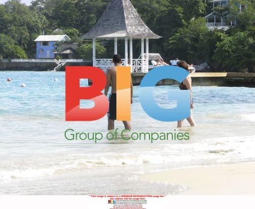 Sir Trevor McDonald on beach vacation