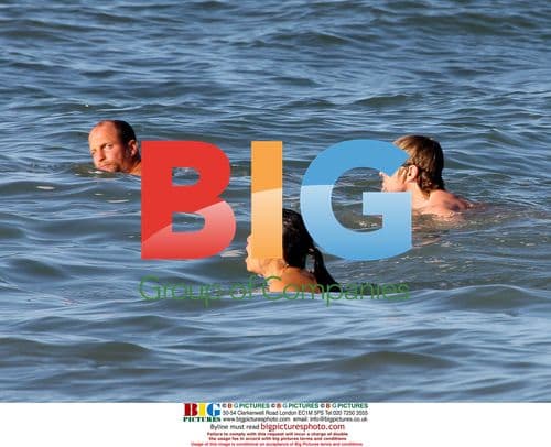 Owen Wilson and Woody Harrelson swim in Maui
