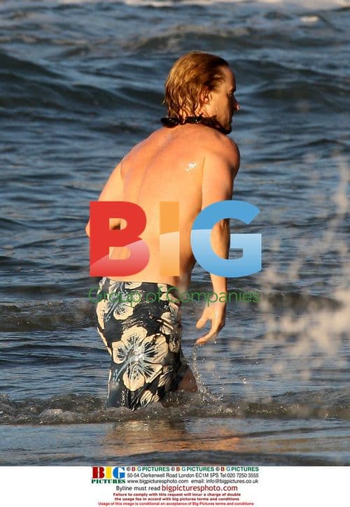 Owen Wilson and Woody Harrelson swim in Maui