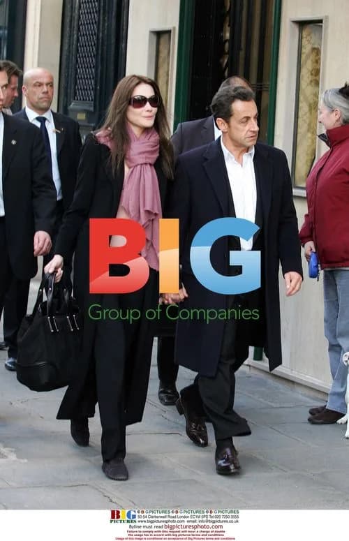 Nicolas Sarkozy Exits Hotel with Carla Bruni