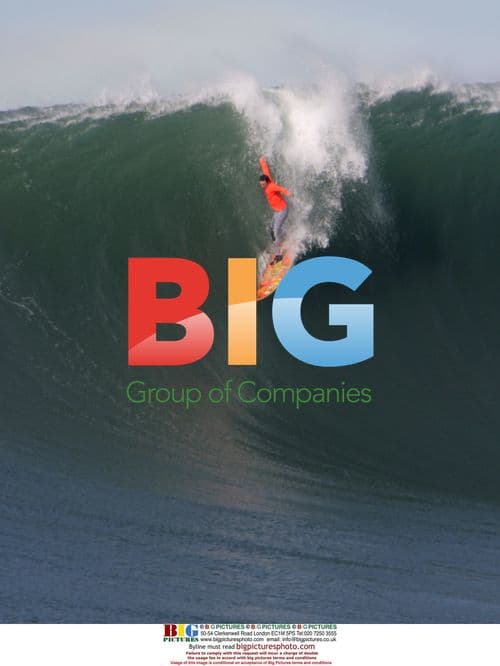 Surfer Darryl Virostko rides giant wave