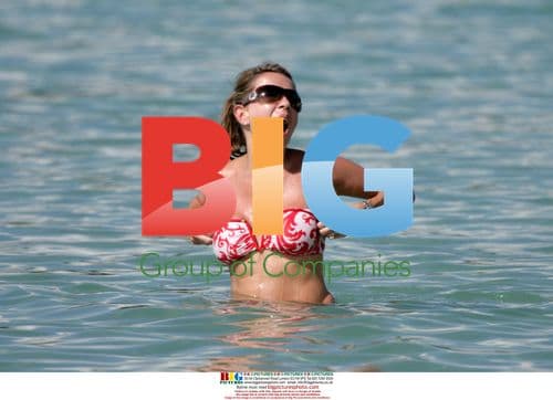 Alan Shearer relaxes with friends in the Caribbean