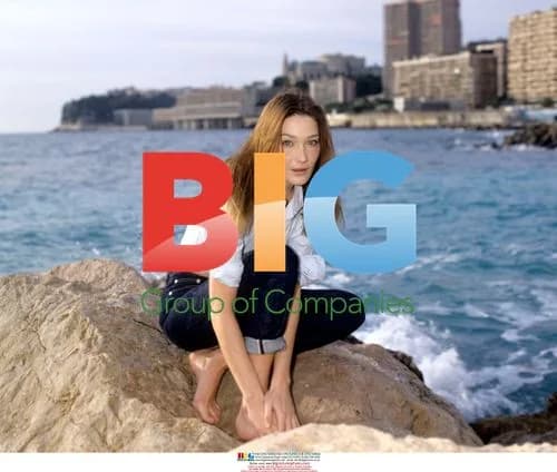 Carla Bruni poses on beach