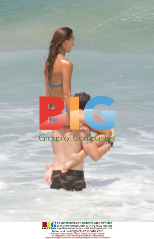 Sharni Vinson and AJ Buckley on Sydney beach