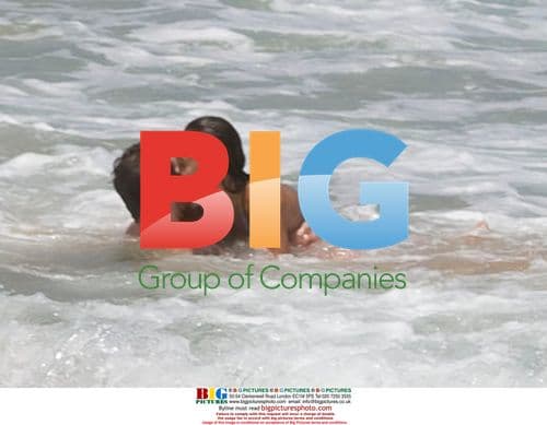 Sharni Vinson and AJ Buckley at the beach