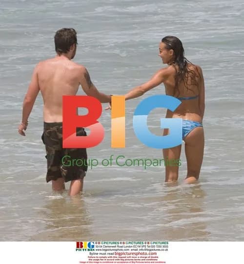 Sharni Vinson and AJ Buckley on Sydney beach