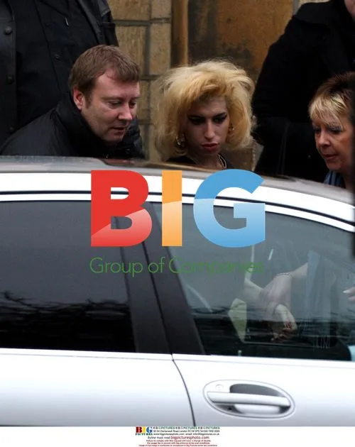 Amy Winehouse and mother-in-law leave court