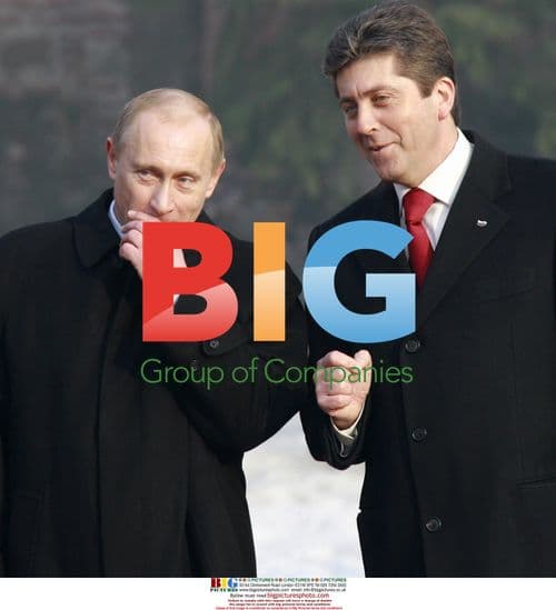 Putin and Parvanov view honor guard in Sofia