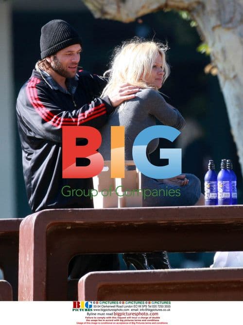 Pamela Anderson and Rick Salomon kissing in Malibu