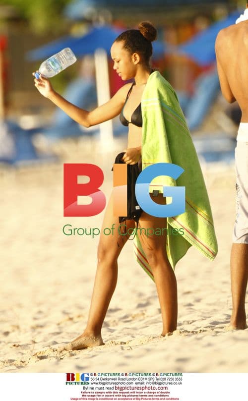 Erykah Badu Relaxes on Caribbean Beach