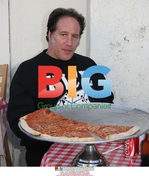 Andrew Dice Clay Enjoys Pizza