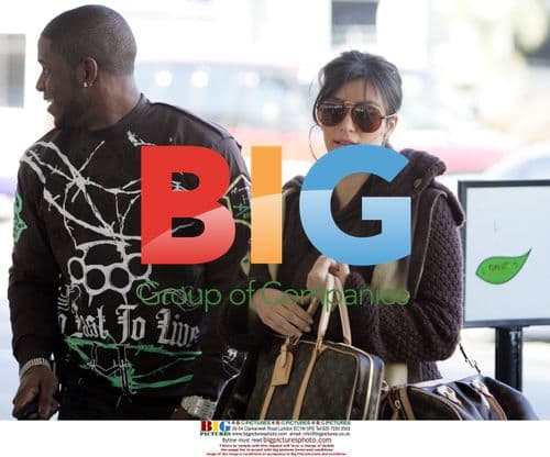 Kim Kardashian and Reggie Bush Depart LAX
