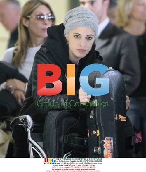 DJ Samantha Ronson blows bubbles at LAX