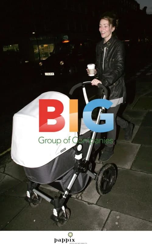 Noel Gallagher's girlfriend with son