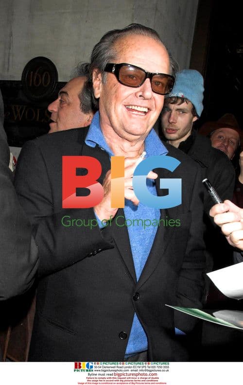 Jack Nicholson clowns around for photographers