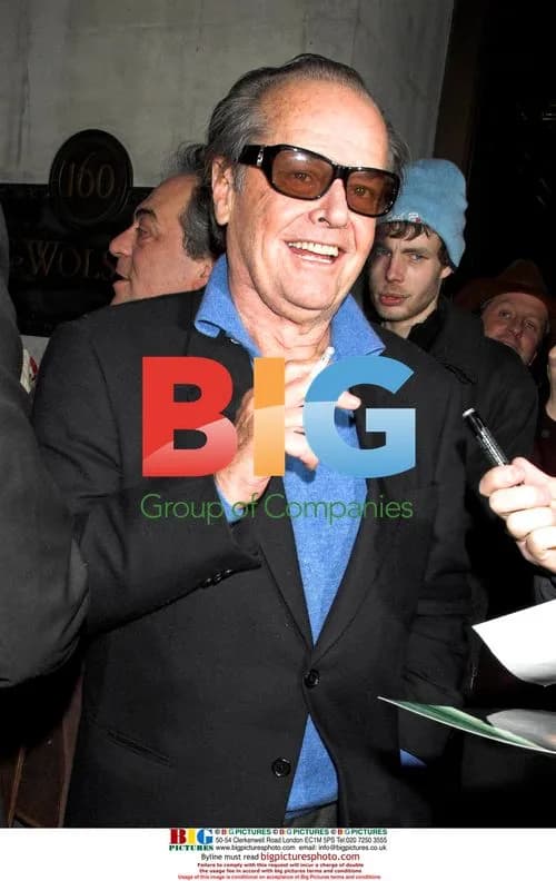 Jack Nicholson clowns around for photographers