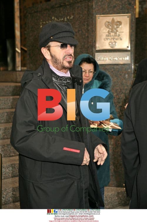 Ringo Starr and Willie Nelson Exit Midtown Hotel