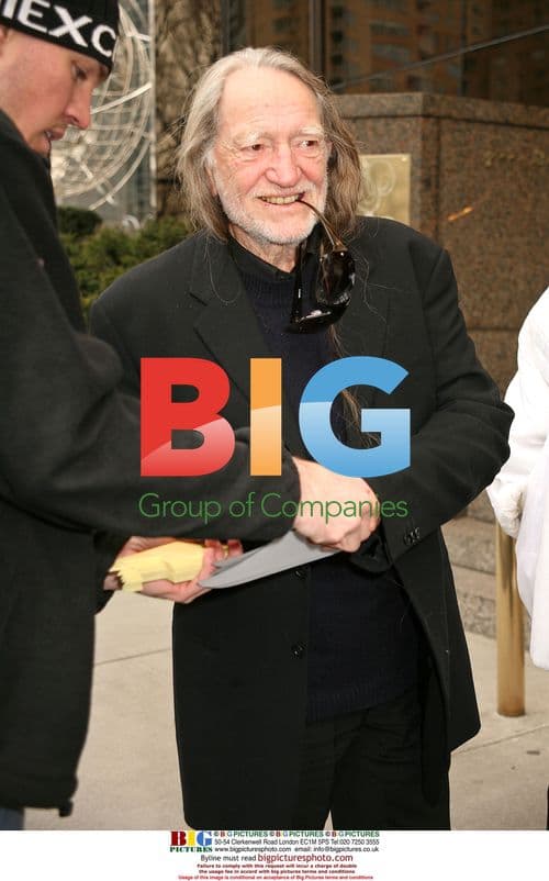 Ringo Starr and Willie Nelson Exit Hotel