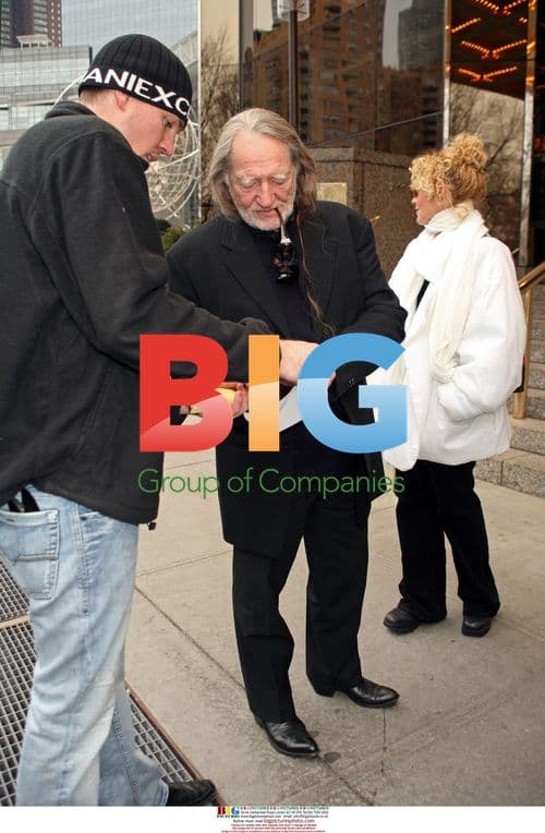 Ringo Starr and Willie Nelson Exit Hotel
