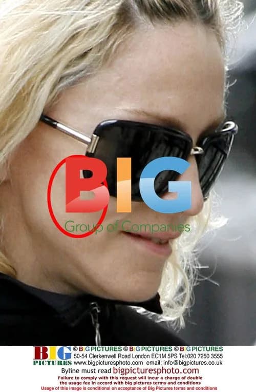 Madonna walks to the gym in London