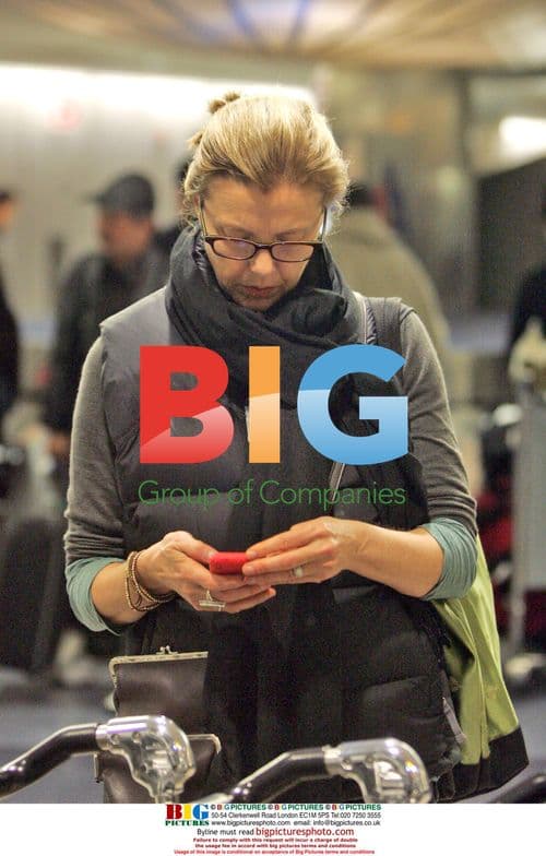 Annette Benning and son at LAX