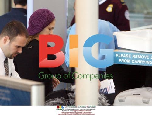 Pregnant Jessica Alba Departs LAX