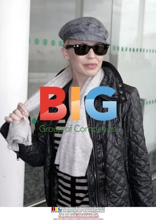 Kylie Minogue arrives at London airport