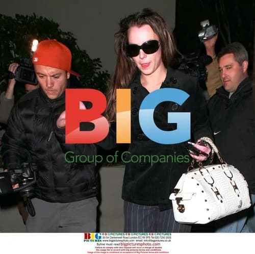 Britney Spears assisted by paparazzi