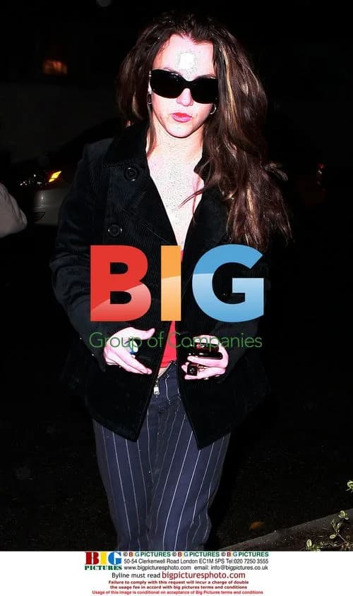 Britney Spears Assisted by Paparazzi