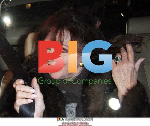 Joan Collins Leaves Mr. Chow Restaurant