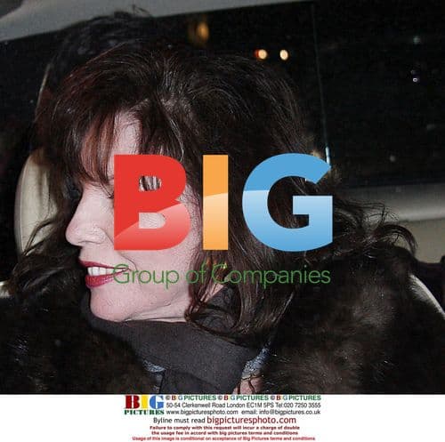 Joan Collins leaves Mr. Chow restaurant