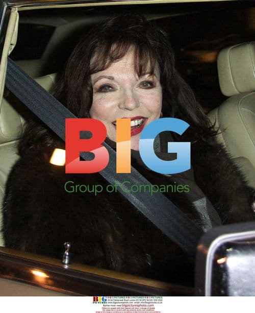 Joan Collins Leaves Mr. Chow with Husband