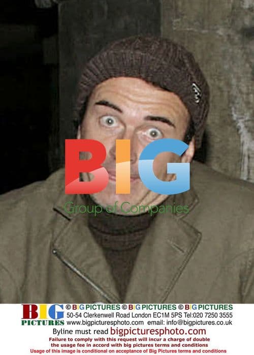 Julian McMahon lands at LAX with female companion