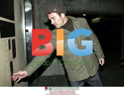 Julian McMahon and friend at LAX