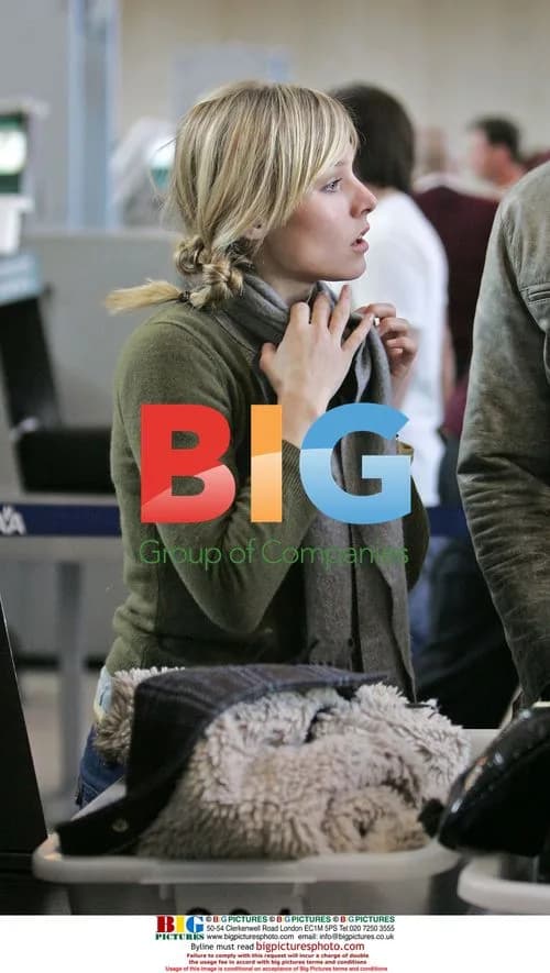 Kristen Bell Departs LAX with Male Friend