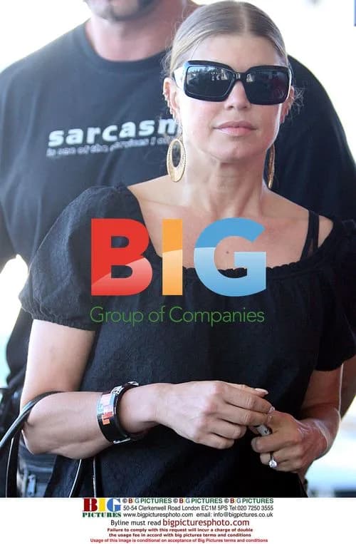 Fergie Arrives at Perth Airport