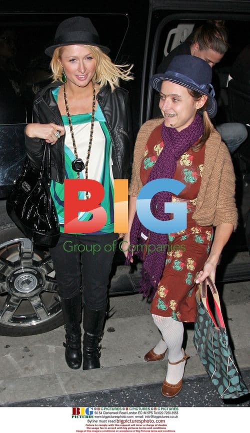 Paris Hilton arrives with 'The Hottie and the Nottie' co-star