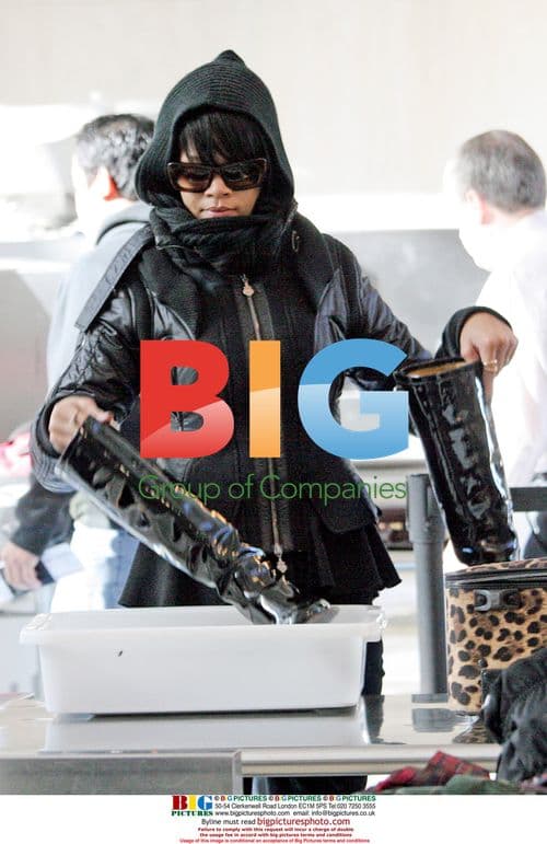 Rihanna Bundled Up at LAX