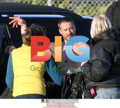 Robert Downey Jr. films for "The Soloist" at LAX